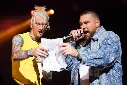 Travis Kelce singing with Machine Gun Kelly during the first Kelce Jam Festival, held in April 2023.